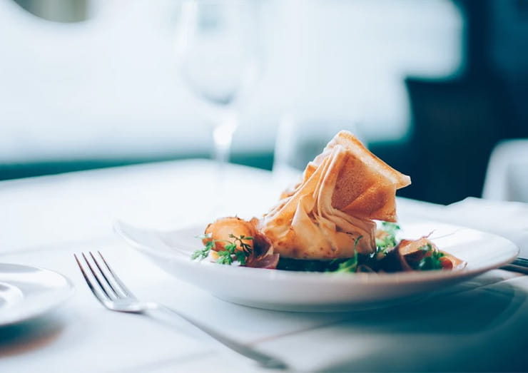 Well Prepared Dish on a White Tablecloth