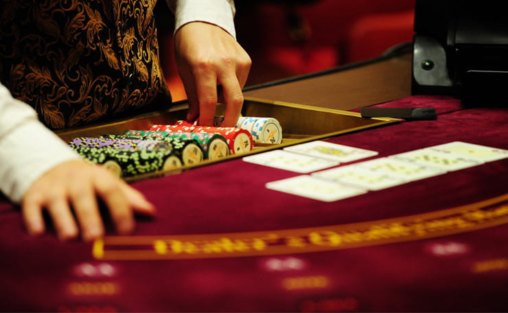 Croupier Dealing Cards