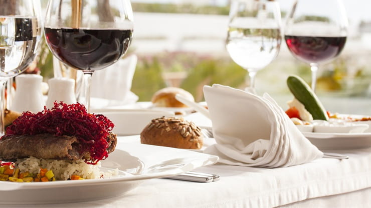 Outdoor Restaurant Table with Dishes & Wine